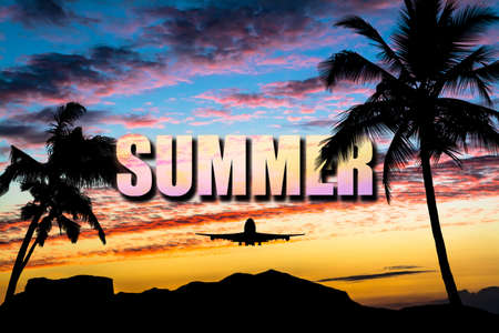 Sunset with silhouettes of mountains and palm trees on the sides of the photo and the word - Summer - in the middle and a flying airplane. Vacation, travel concept.の写真素材