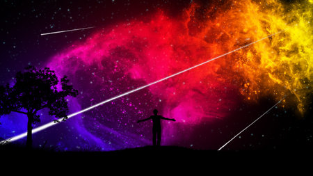 A man standing on the grass on a hill with a tree, admires the starry sky with a beautiful...