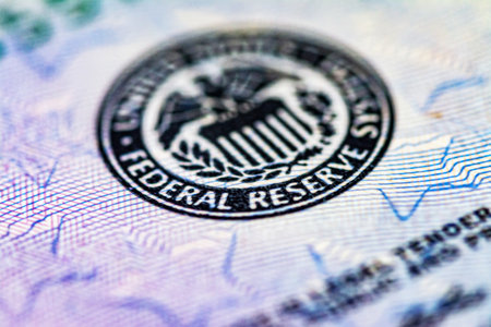 Symbol of the US Federal Reserve System on the US 5 dollar bill. Fed emblem close-up on american currency.の写真素材