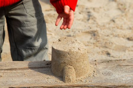 A child playing with the sandの写真素材