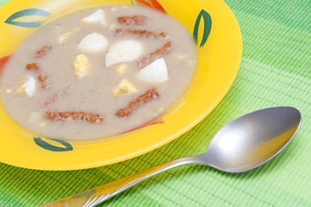 Soup with sausages and eggsの写真素材