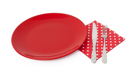 Red plate and cutleryの写真素材
