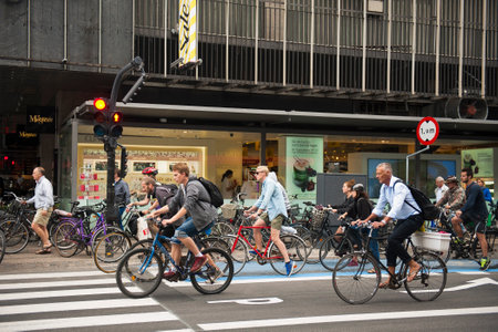 COPENHAGEN, DENMARK - JULY 2  Many people biking in centre of city on July 2, 2014 in Copenhagen