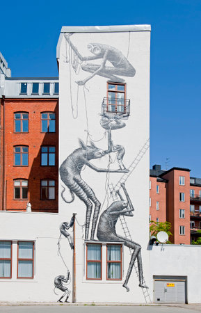 MALMO, SWEDEN - JUNE 30: Mural in the center of Malmo on June 30, 2014 in Malmo. Created by Phlegm for ArtScape Festival.のeditorial素材
