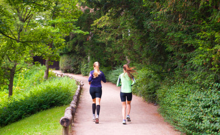 COPENHAGEN, DENMARK - JULY 3: Running in the park on July 3, 2014 in Copenhagen.のeditorial素材