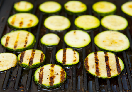 Courgette isolated on the grill backgroundの写真素材
