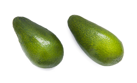 Two fresh avocado isolated on white backgroundの写真素材