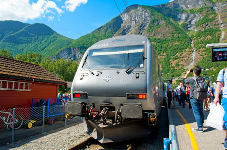 MYRDAL-FLAM, NORWAY - JULY 16, 2018: Breathtaking Norwegian fjord and mountain landscapes during the Nutshell Tour. The Flam Railway Flamsbana in Flam.のeditorial素材