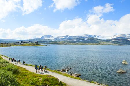 Tourists and beautiful mountain landscape in Finse, Norway on July 28 2019の写真素材