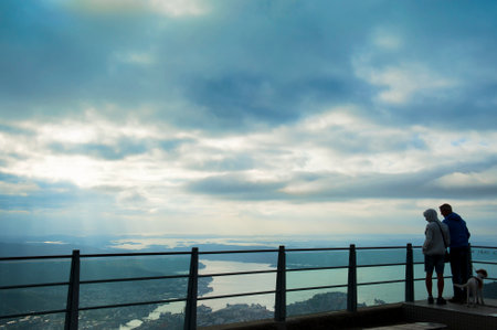 BERGEN, NORWAY - AUGUST 4, 2019: Beautiful landscape and sunset seen from the Mount Ulriken in Bergenのeditorial素材