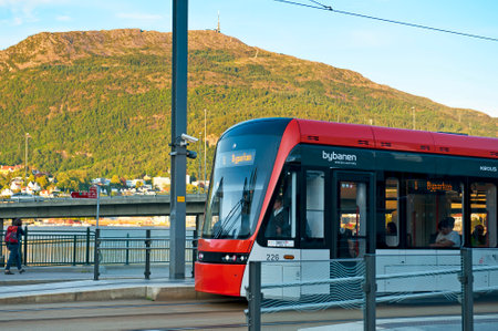 BERGEN, NORWAY - JULY 19, 2018: Bergen Light Rail - Bybanen and Ulriken Mountのeditorial素材