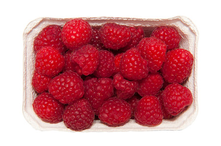 Top view of fresh raspberries isolated on white backgroundの写真素材