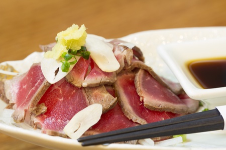 Slices of delicious roast beef with say sauce tasteの写真素材