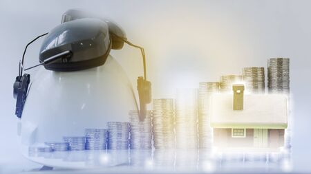 Double exposure image of money stacking as big growth of profit or successful of house construction cost management, business and financial concept.の写真素材