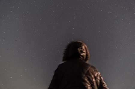 male and starlit sky の写真素材