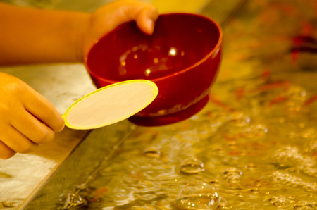 Goldfish scoopingの写真素材