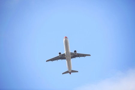 the airplane with blue sky.の写真素材