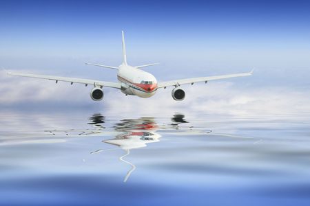 the airplane on  the blue sky background.の写真素材