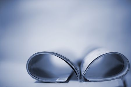 book accumulating on the white background.の写真素材