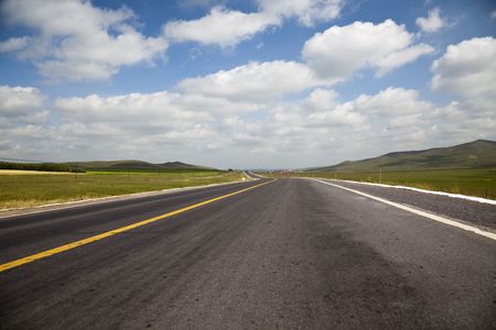 the road of the meadow.の写真素材