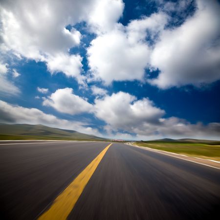 the background of the road wiht cloud of a meadow china.の写真素材