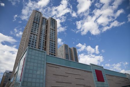 the modern building on the cloudy background in china.の写真素材
