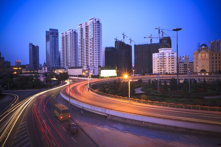 Traffic through downtown  the lujiazui financial centre in shanghai china.の写真素材