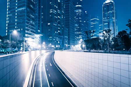 the light trails on the modern building background in shanghai china.の写真素材