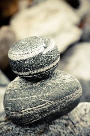 Stones Stacked Up on the sand beach outdoor.の写真素材