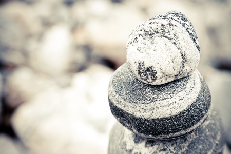 Stones Stacked Up on the sand beach outdoor.の写真素材
