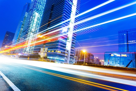 the light trails on the modern building background in shanghai china.の写真素材