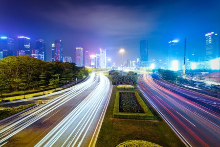 the light trails on the modern building background in shanghai china.