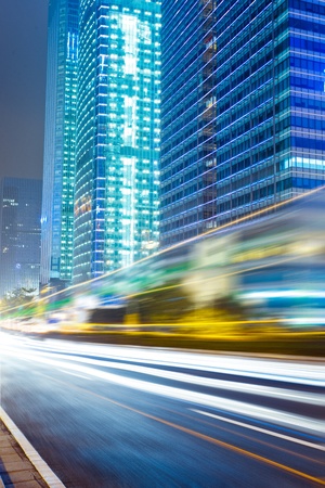the light trails on the modern building background in shanghai china.の写真素材
