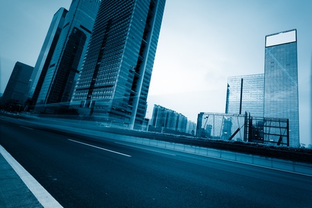 the light trails on the modern building background in shanghai china.の写真素材