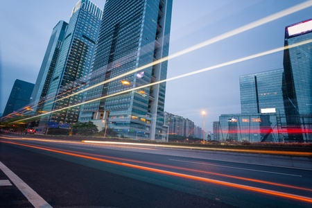 the light trails on the modern building background in shanghai china.の写真素材