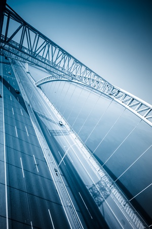 highway and modern bridge of city,blue toned.の写真素材