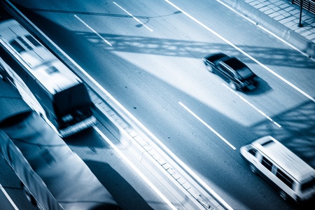 highway and modern bridge of city,blue toned.の写真素材