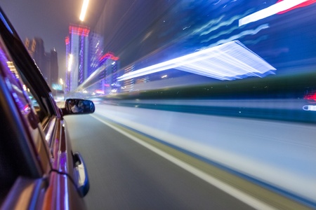 View from Side of Car Going Around Corner, Blurred Motionの写真素材