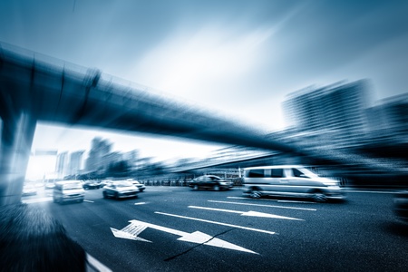 group of cars on the street road at shanghai china.の写真素材