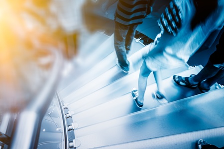 Modern Glass StaircaseSilhouette of walking People in shanghai china.の写真素材