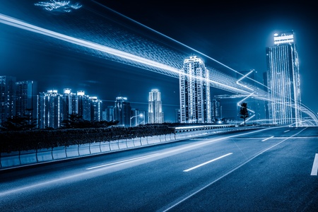 the light trails on the modern building background in shanghai china.の写真素材