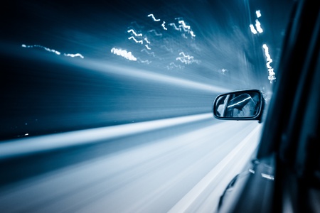View from Side of Car Going Around Corner, Blurred Motionの写真素材