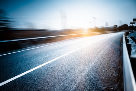 highway and modern bridge of city,blue toned.の写真素材