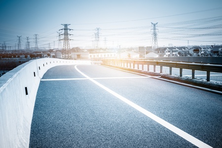 highway and modern bridge of city,blue toned.の写真素材