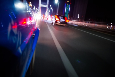 View from Side of Car Going Around Corner, Blurred Motionの写真素材