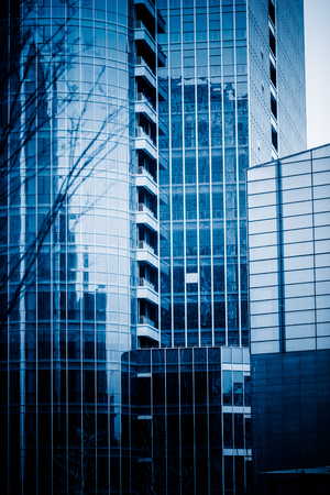 modern building exterior,blue toned image.の写真素材