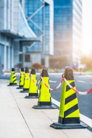 Traffic cones in line at roadside,shanghai china.の写真素材
