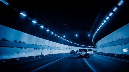 car driving through tunnelの写真素材
