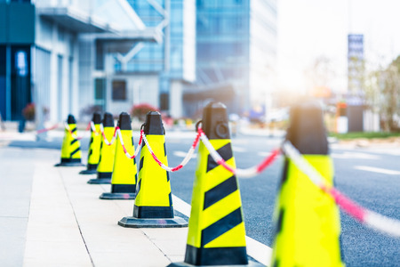Traffic cones in line at roadside,shanghai china.の写真素材