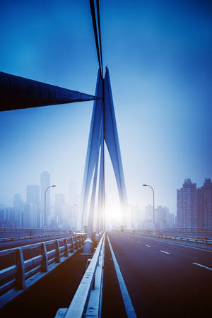 low angle view of bridge structure,blue toned image.の写真素材